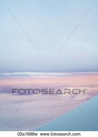Above the pink clouds View Large Photo Image Stock Photo - Above the pink clouds. Fotosearch