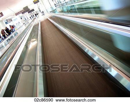 Stock Image - Abstract view of airport moving sidewalk.. Fotosearch
