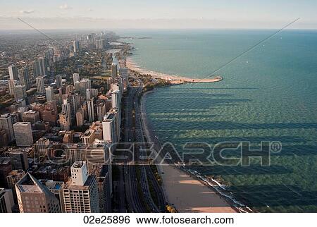 Stock Photograph - Aerial view of Chicago, Lake Shore Drive and Lake Michigan. Fotosearch