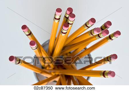 Aerial view of new orange HB pencils in holder, on white background. View Large Photo Image Stock Image - Aerial view of new orange HB pencils in holder, on white background.. Fotosearch