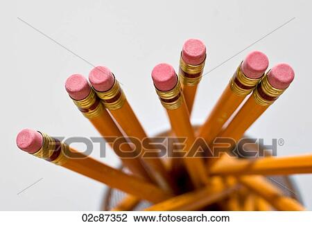 Aerial view of new orange HB pencils in holder, on white background. View Large Photo Image Stock Image - Aerial view of new orange HB pencils in holder, on white background.. Fotosearch