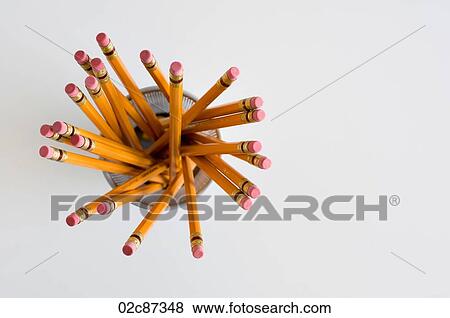 Stock Photo - Aerial view of new orange HB pencils in holder, on white background.. Fotosearch