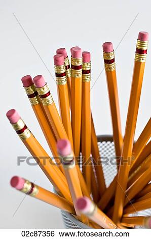 Aerial view of new orange HB pencils in holder, on white background. View Large Photo Image Stock Photograph - Aerial view of new orange HB pencils in holder, on white background.. Fotosearch