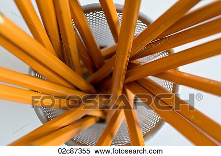 Aerial view of new orange HB pencils in holder, on white background. View Large Photo Image Stock Photography - Aerial view of new orange HB pencils in holder, on white background.. Fotosearch