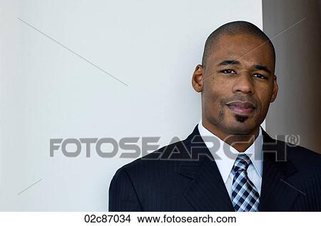 Picture - African-american businessman in suit.. Fotosearch