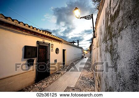 An alleyway in Andalusia, Spain View Large Photo Image Stock Photography - An alleyway in Andalusia, Spain. Fotosearch
