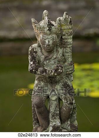 Ancient statue in Bali View Large Photo Image Stock Image - Ancient statue in Bali. Fotosearch