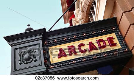 Arcade sign on old movie theatre playbill. View Large Photo Image Stock Photograph - Arcade sign on old movie theatre playbill.. Fotosearch