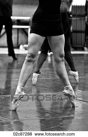 Stock Photo - Ballet dancer warming up and practicing.. Fotosearch