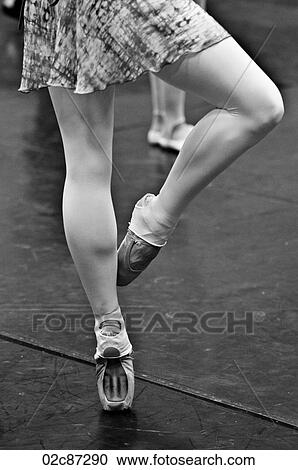 Ballet dancers practicing dance moves. View Large Photo Image Stock Image - Ballet dancers practicing dance moves.. Fotosearch