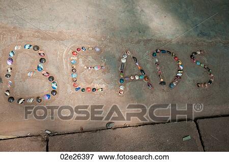 Beads in a sign View Large Photo Image Stock Photo - Beads in a sign. Fotosearch