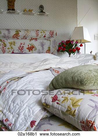 Bed with flowers and pillows View Large Photo Image Stock Image - Bed with flowers and pillows. Fotosearch