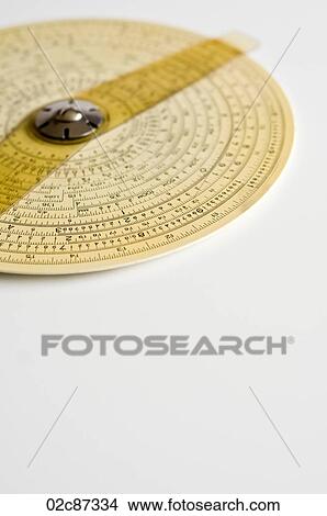Binary Concentric Slide Ruler on white background. View Large Photo Image Picture - Binary Concentric Slide Ruler on white background.. Fotosearch
