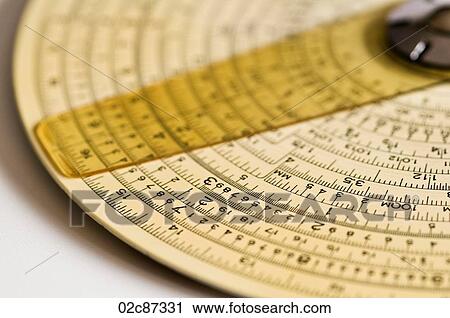 Stock Image - Binary Concentric Slide Ruler on white background.. Fotosearch