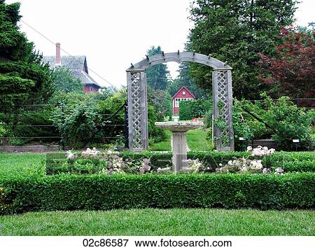 Birdbath and arbour in country garden. View Large Photo Image Stock Photo - Birdbath and arbour in country garden.. Fotosearch