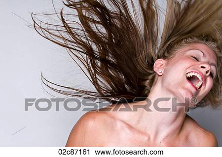 Blonde woman flinging hair. View Large Photo Image Stock Image - Blonde woman flinging hair.. Fotosearch