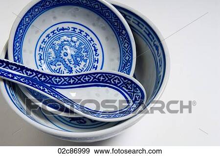 Stock Photo - Blue asian soup bowls and spoon.. Fotosearch