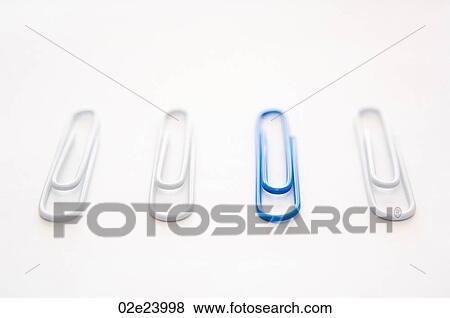 Blue paper clip with collection of white ones. View Large Photo Image Stock Photo - Blue paper clip with collection of white ones.. Fotosearch