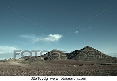Blue sky and arid hills View Large Photo Image Stock Image - Blue sky and arid hills. Fotosearch