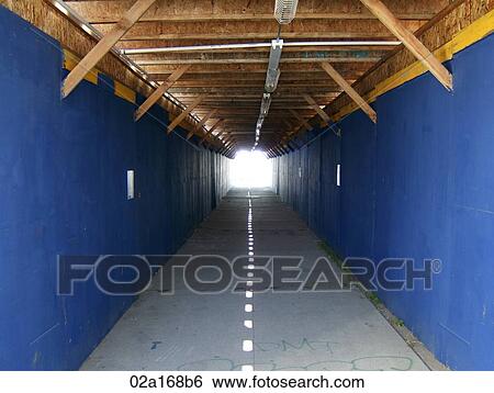 Blue tunnel with light at the end View Large Photo Image Stock Photograph - Blue tunnel with light at the end. Fotosearch