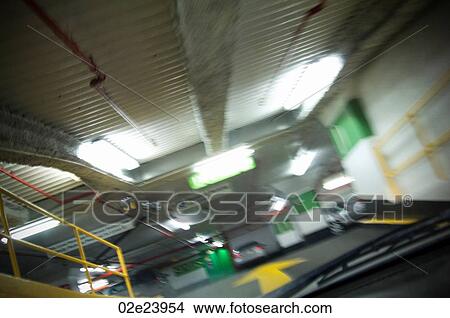 Blurred interior of under ground parking garage. View Large Photo Image Picture - Blurred interior of under ground parking garage.. Fotosearch