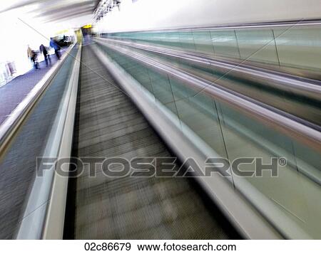 Blurred view of moving airport walkway. View Large Photo Image Stock Photo - Blurred view of moving airport walkway.. Fotosearch