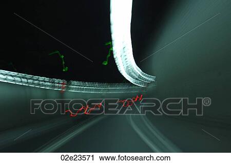 Blurring car lights in road tunnel. View Large Photo Image Stock Image - Blurring car lights in road tunnel.. Fotosearch
