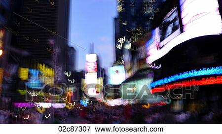 Blurring lights of downtown Times Square, New York City, USA. View Large Photo Image Stock Photo - Blurring lights of downtown Times Square, New York City, USA.. Fotosearch