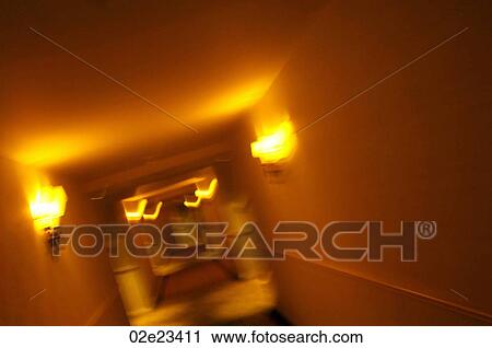 Stock Image - Blurry shot of firey hallway.. Fotosearch