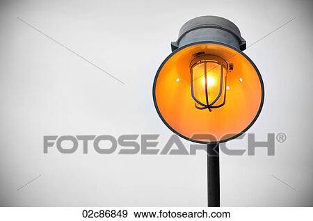 Bright orange industrial safety light. View Large Photo Image Stock Photo - Bright orange industrial safety light.. Fotosearch