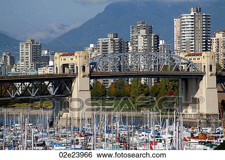 Stock Photograph - Burrard bridge with marina Vancouver B. C. Canada.. Fotosearch