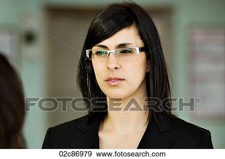 Business woman wearing stylish glasses. View Large Photo Image Stock Photo - Business woman wearing stylish glasses.. Fotosearch