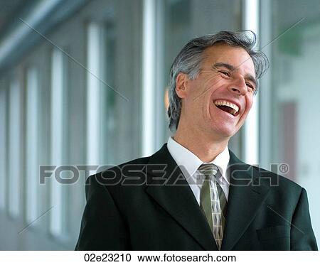Businessman laughing out loud. View Large Photo Image Stock Image - Businessman laughing out loud.. Fotosearch