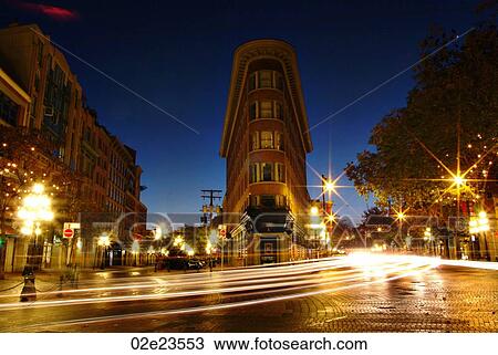 Stock Image - Busy night roadway in Gastown, Vancouver Canada.. Fotosearch