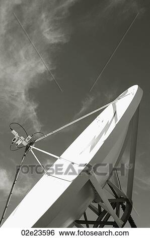 Stock Photograph - B&W communications satellite dish.. Fotosearch