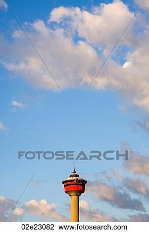 Calgary Tower with blue sky above. View Large Photo Image Stock Image - Calgary Tower with blue sky above.. Fotosearch