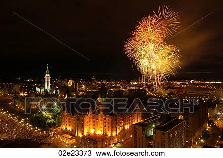 Stock Image - Canada Day fireworks over Ottawa, Canada.. Fotosearch