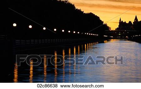 Canadian cities, evening view of the Rideau Canal waterway, Ottawa Canada. View Large Photo Image Stock Photo - Canadian cities, evening view of the Rideau Canal waterway, Ottawa Canada.. Fotosearch