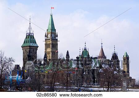 Stock Image - Canadian cities, winter view of Government Parliament Buildings, Ottawa Canada.. Fotosearch