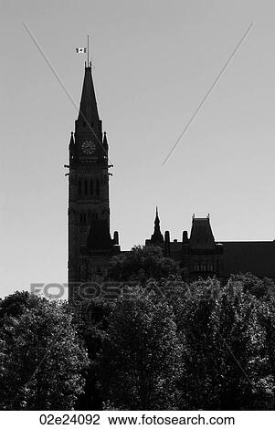 Stock Image - Canadian flag at half staff on Ottawa's Peace Tower.. Fotosearch