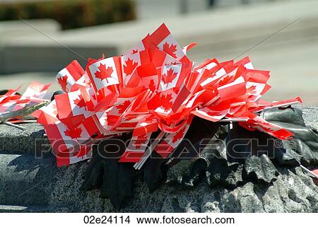 Picture - Canadian flags laid on the Tomb of the Unknown Soldier, Ottawa Canada.. Fotosearch