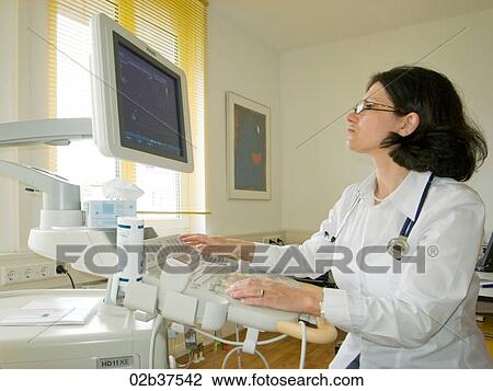 Cardiologist performs transthoracic echocardiogram View Large Photo Image Stock Image - Cardiologist performs transthoracic echocardiogram. Fotosearch