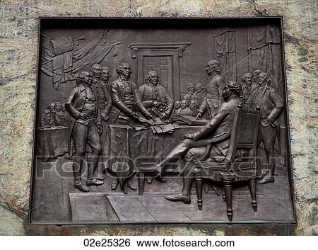 Stock Photograph - Carved plaques on the side of the Benjamin Franklin statue in Boston, Massachusetts, USA. Fotosearch