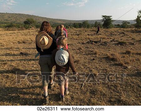 Stock Image - Caucasian tourists in Kenya Africa. Fotosearch
