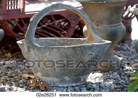 Stock Image - Ceramic basket in the Hamptons. Fotosearch