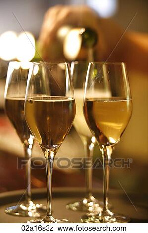 Champagne Being Poured View Large Photo Image Stock Photo - Champagne Being Poured. Fotosearch