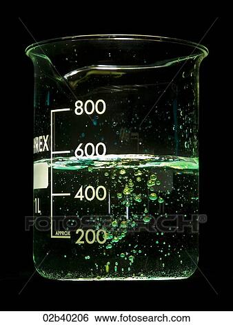 Chemical reaction in scientific beaker, Green lighting View Large Photo Image Stock Photograph - Chemical reaction in scientific beaker, Green lighting. Fotosearch