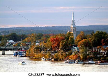 Stock Photo - Church surrounded by trees, Gatineau waterfront, Quebec, Canada.. Fotosearch
