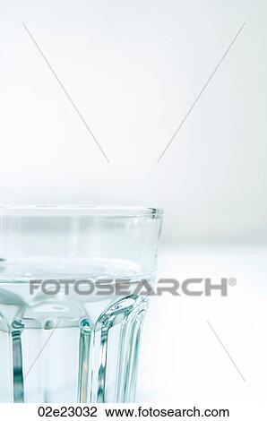 Clear glass of water on white. View Large Photo Image Stock Image - Clear glass of water on white.. Fotosearch