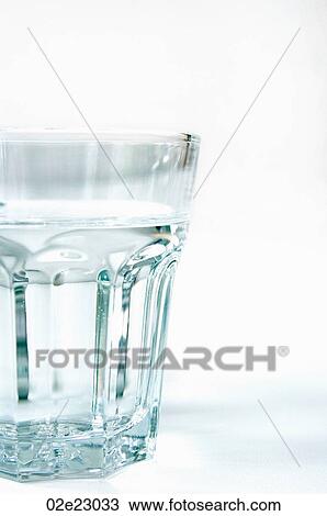 Stock Image - Clear glass tumbler of water.. Fotosearch